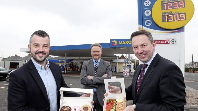 Pictured at Maxol Service Station, Glenabbey are: Peter Robinson, licensee of Maxol Glenabbey Service Station; Kevin Paterson, Maxol retail manager Northern Ireland; and Brian Donaldson, CEO of The Maxol Group. 