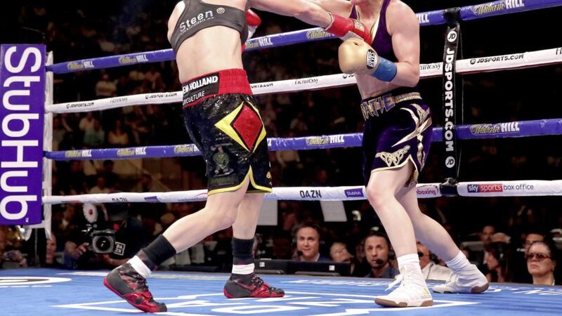 Katie Taylor in action against Delfine Persoon in the IBF, WBC, WBO, WBA, Ring Magazine Women&#39;s Lightweight World Championships fight at Madison Square Garden 
