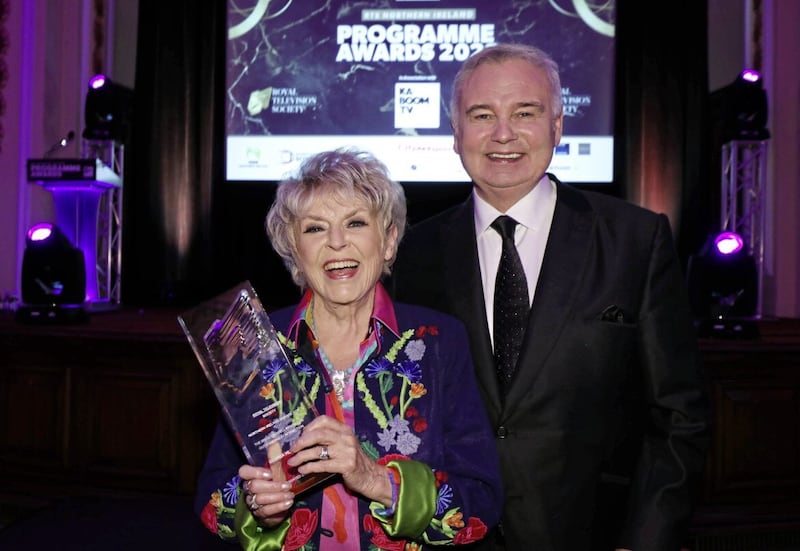 In recognition of her trailblazing broadcasting career, Gloria Hunniford won the RTS NI Brian Waddell Award for Outstanding Contribution at a ceremony in Belfast in May. She is pictured with her friend Eamonn Holmes, who presented her with the award. Picture by Darren Kidd/Presseye. 