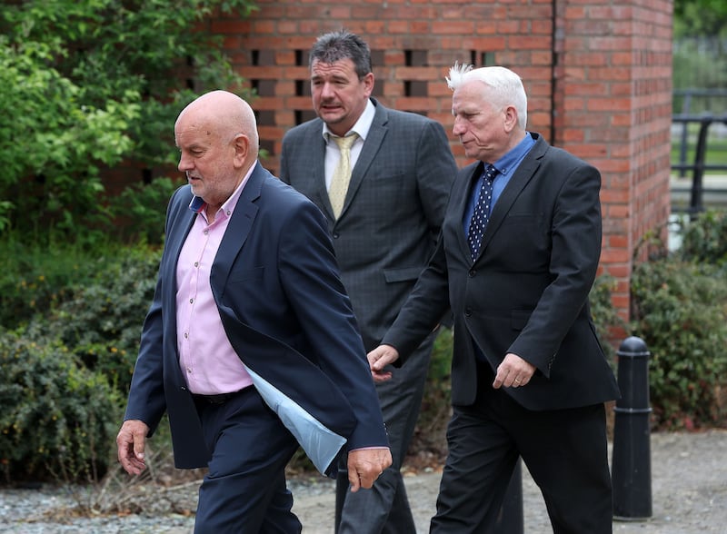 Representives of the Norman Emerson Group Colin Emerson, George Emerson and Conor Jordan at the employment tribunal taken by former employee Andrew McDade. Picture by Mal McCann