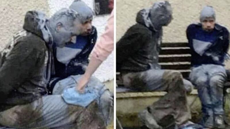 Footage posted on social media showed the pair tied up and covered in paint on a bench in the village of Mullaghbawn in south Armagh. Picture from Facebook 