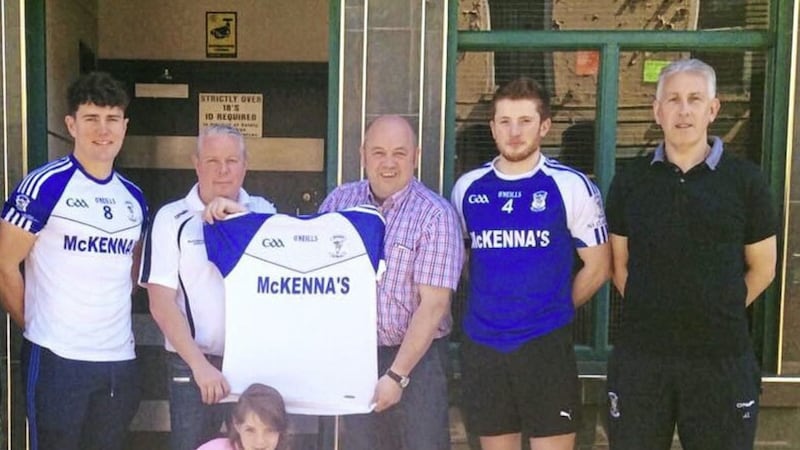 Armagh Harps manager John Toner (back row, right) pictured with former player Frank McKenna (second from left) and players and supporters at the announcement of McKenna&#39;s Bar, Armagh as senior team sponsors 