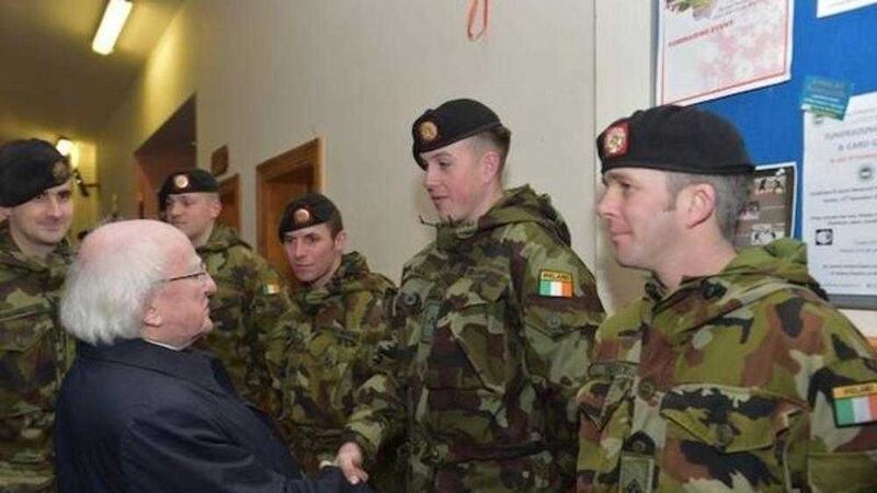 Irish president Michael D Higgins met members of the Irish Defence Forces who have helped deal with flooding 