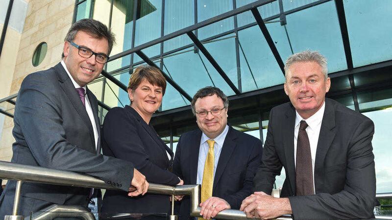 Arlene Foster and Dr Stephen Farry are joined by Alastair Hamilton, Invest NI, and Alistair Niederer, Teleperformance at the jobs announcement 