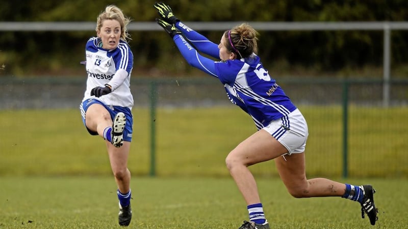 Monaghan&#39;s Ciara McAnespie in action against Jane Moone of Laois in the Tesco HomeGrown Ladies National Football League Division 1 Round 4 on March 1 2015. at Crettyard GAA club, in Co. Laois. Picture credit: Pat Murphy / SPORTSFILE 