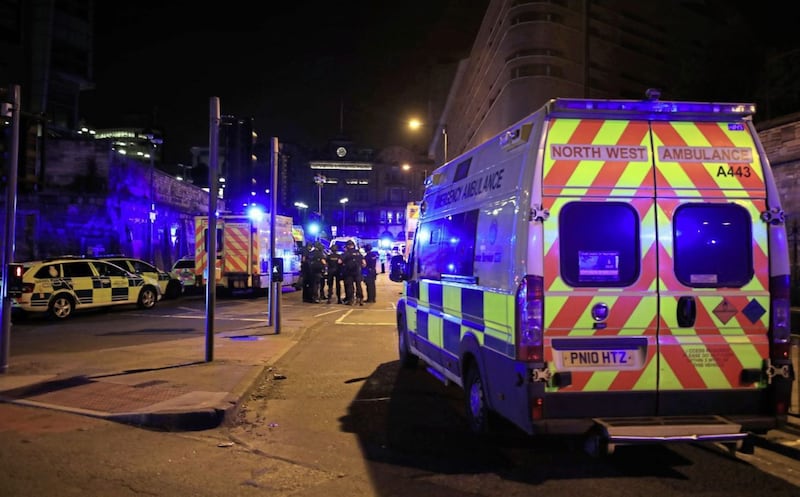 Emergency services at Manchester Arena after reports of an explosion at the venue during an Ariana Grande gig. PRESS ASSOCIATION Photo. Picture date: Monday May 22, 2017. See PA story POLICE Explosion. Photo credit should read: Peter Byrne/PA Wire. 
