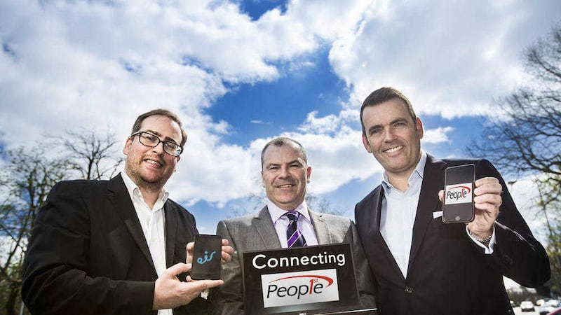 From left, Martin Lyons of Zenith Networks; Ronan Heenan of People 1st; and Matt McCloskey, eir Business NI celebrate the new contract 