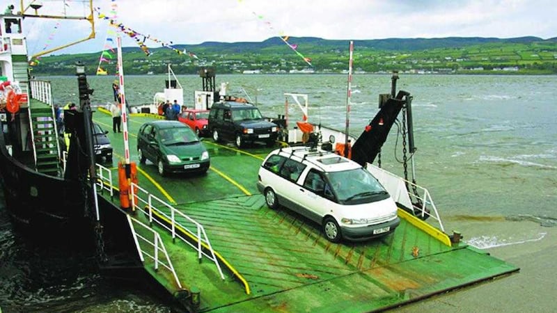 Cars roll off the Magilligan to Greencastle ferry at the Co Derry port before the service was suspended last year 