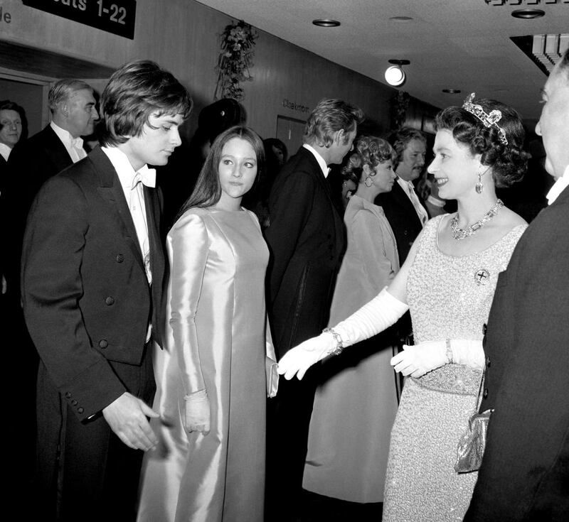 Queen Elizabeth II talking with Olivia Hussey and Leonard Whiting