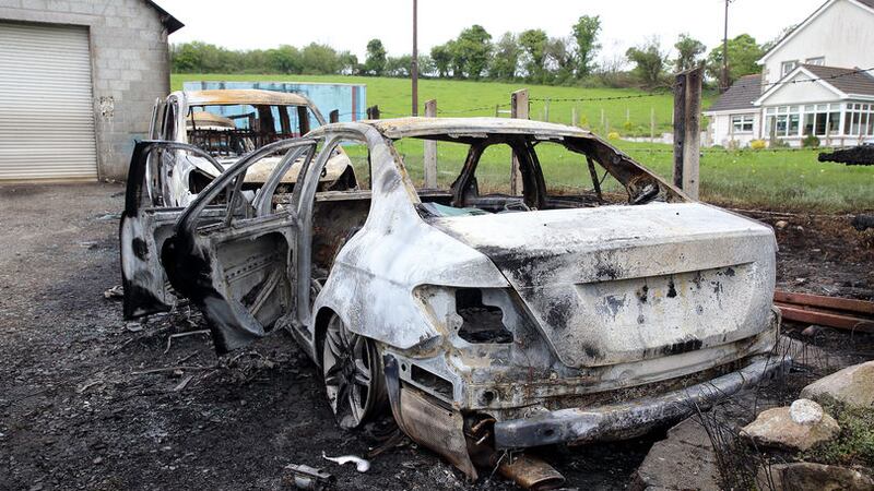&nbsp;<span style="font-family: Arial, sans-serif; ">&nbsp;Nine vehicles were burnt out in the fire near commercial premises on the Tullysaran Road, on the outskirts of Armagh city. Picture by Cliff Donaldson</span>