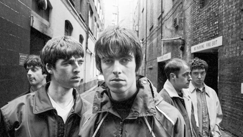 Oasis in 1994, with the band&#39;s original drummer Tony McCarroll on the right 