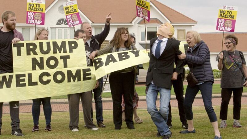 Activists from Stand Up to Racism Scotland (SUTR) stage a protest at the Trump Turnberry resort in South Ayrshire, ahead of the US president&#39;s arrival in the UK. Picture by David Cheskin, Press Association 