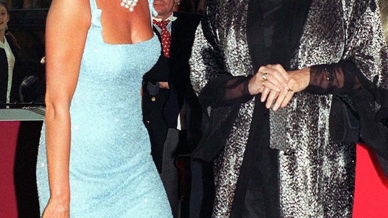 Diana wearing Jimmy Choo shoes in 1997 (John Stillwell/PA)