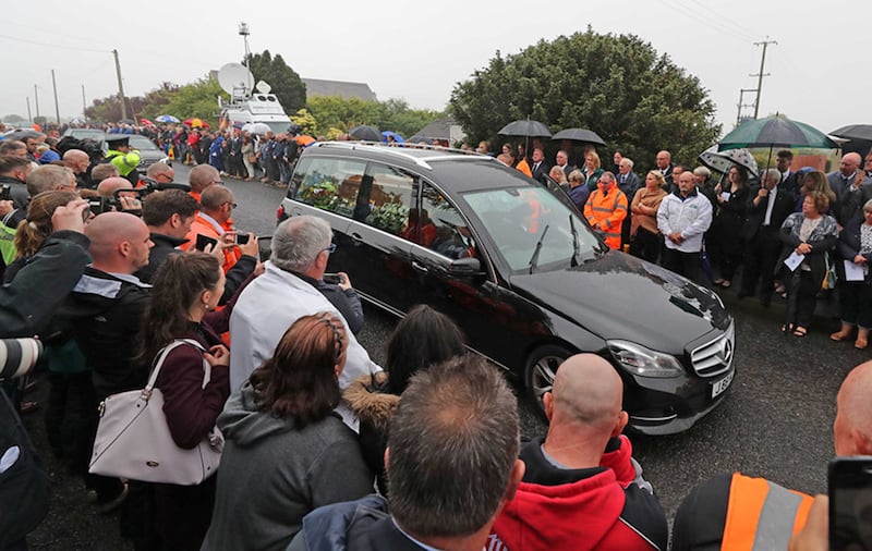 &nbsp;Hundreds of mourners line the route as the funeral of Road Racing champion William Dunlop takes place at at Garryduff Presbyterian Church, Ballymoney after he died in a crash during practice for the Skerries 100 in County Dublin