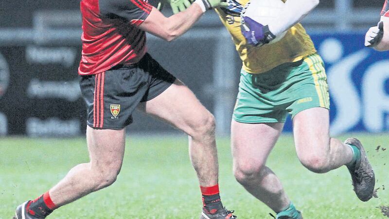 Donegal&rsquo;s Paddy McBrearty (right) shrugs off Down&rsquo;s Darren O&rsquo;Hagan during Saturday night&rsquo;s NFL Division One clash in Newry&nbsp;