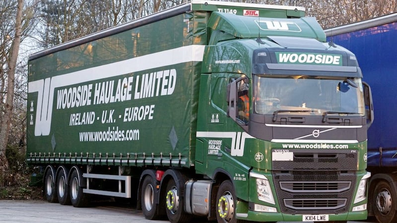 The family-owned Woodside haulage group has enjoyed a &quot;satisfactory&quot; trading year in what it said was a challenging operating environment 