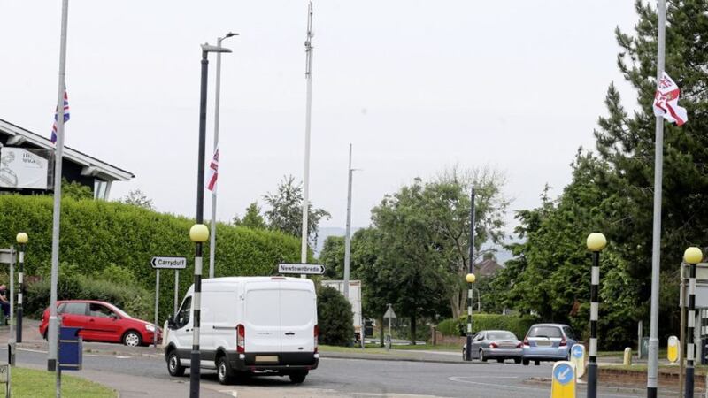 Flags were erected at the Four Winds roundabout in south Belfast. Picture by Hugh Russell 