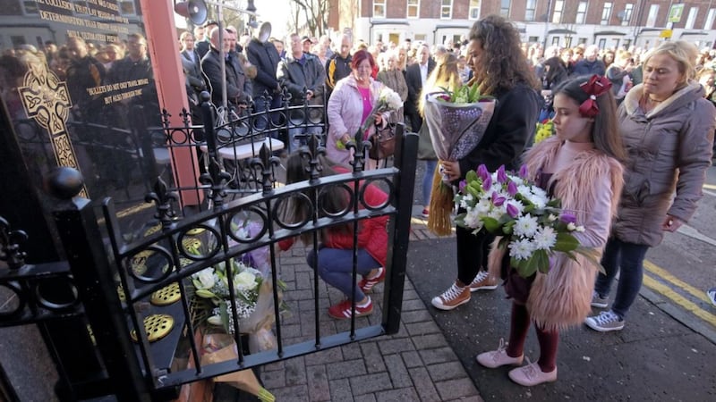 Relatives lay wreaths at yesterday&#39;s memorial for victims of the murders in 1992 at bookies Sean Graham&#39;s on the Ormeau Road. Picture by Cliff Donaldson 