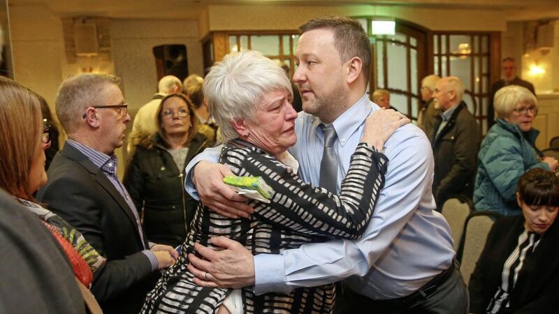Jennifer Roberts, whose nine-year-old daughter Claire died of hyponatraemia in October 1996, was comforted by her son Gareth following the publication of the findings of the hyponatraemia inquiry. Picture by Mal McCann 