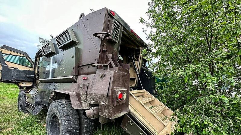 A damaged armoured military vehicle is seen after fighting in Russia’s western Belgorod region (Vyacheslav Gladkov/AP)