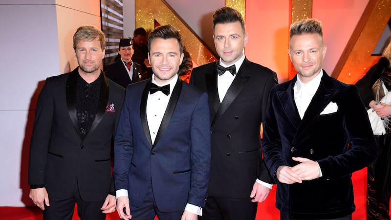 The chart-topping boyband also announced plans for a world tour.