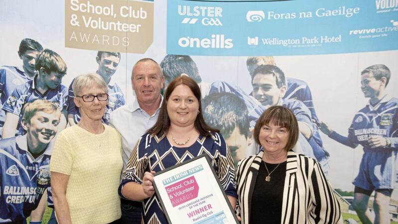 Anne-Marie McNaughton and Mary O&rsquo;Neill from Ruari &Oacute;g are presented with their award for Best Irish Language Initiative at the Irish News School, Club &amp; Volunteer Awards by Edel N&iacute; Chorr&aacute;in from Foras na Gaeilge 