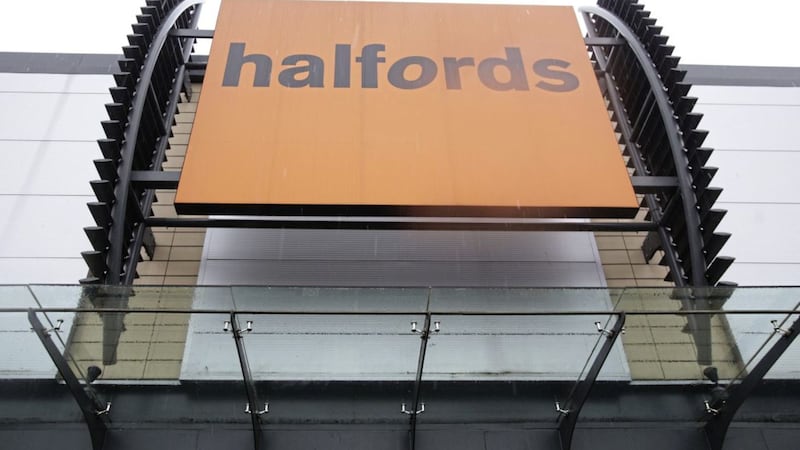 Halfords notched up a hike in sales thanks to surging demand for roof boxes and camping gear as more people in the UK chose to &quot;staycation&quot; 