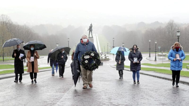 Oliver McVeigh, whose brother Columba McVeigh was murdered and secretly buried by the IRA in 1975, leads a Silent Walk in memory of those who were Disappeared at Stormon. A wreath was laid on the steps of Parliament Buildings to commemorate the victims. Picture by Stephen Davison 