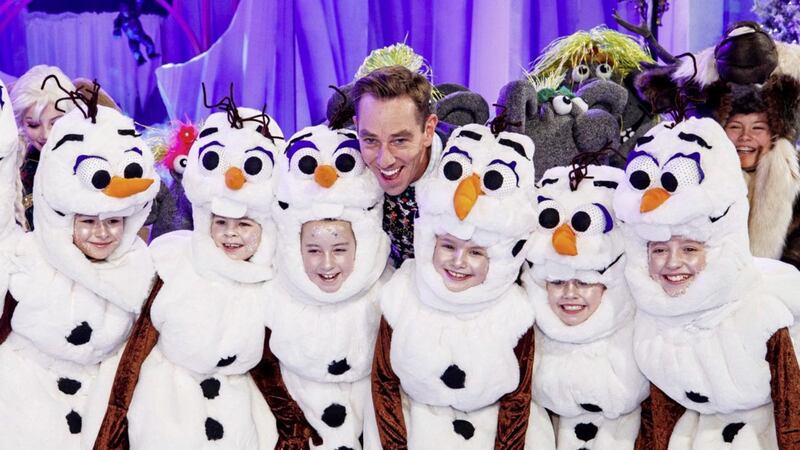 Ryan Tubridy with children from the Spotlight stage school on the set of The Late Late Toy Show 2019 which this year is themed around the Disney movie Frozen. Picture by Andres Poveda 