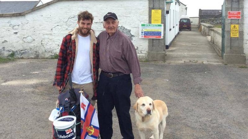 Alex Ellis-Roswell joining the campaign to preserve St John&#39;s Point beacon with 84-year-old former lighthouse keeper Henry Henvey, and Henry&#39;s labrador Jake 