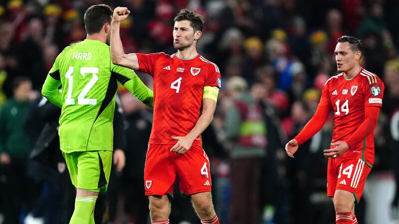 Ben Davies, centre, celebrates Wales’ win over Croatia last month (Nick Potts/PA)