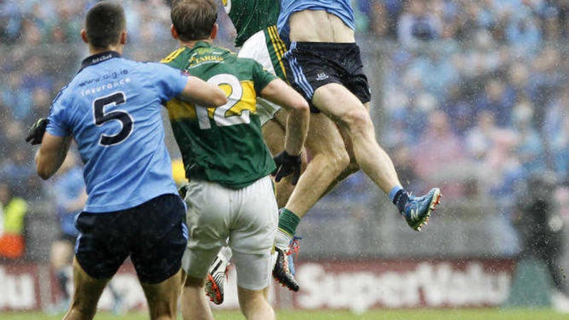 Dublin's Michael Darragh Macauley in a fierce contest with Kerry's Anthony Maher during the All-Ireland final at Croke Park <br />Picture: Colm O'Reilly