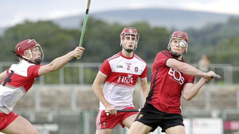 Derry&#39;s Martin Bradley and Daire Kelly with Stuart Martin of Down during the All-Ireland Under 20 B Hurling Championship semi-final match at Owenbeg on Saturday July 20 2019. Picture by Margaret McLaughlin. 