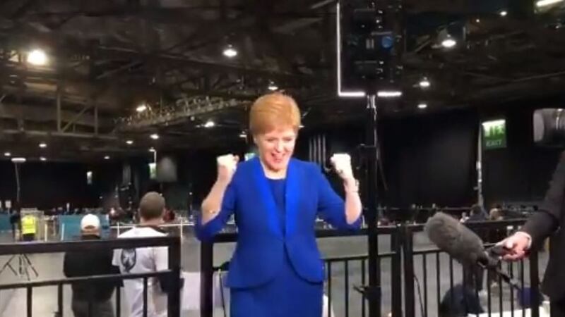 The SNP leader shook her fists in the air and clapped after her party’s candidate Amy Callaghan took Dunbartonshire East.