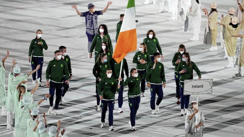 Irish flagbearers Kellie Harrington and Brendan Irvine lead out the team during yesterday&#39;s opening ceremony of the Tokyo 2020 Olympic Games. Picture by PA 