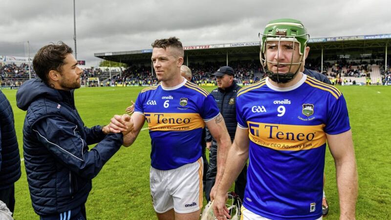 Tipperary strength and conditioning coach Cairbre &Oacute; Caireall&aacute;in (left) with players Padraic Maher and Noel McGrath after beating Limerick during the Munster SHC. Photo by Diarmuid Greene/Sportsfile
