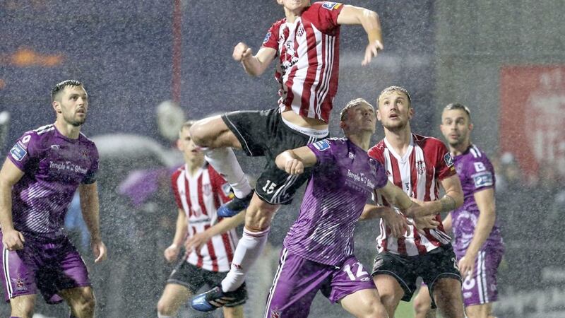 Eoin Toal clears a Dundalk cross during the EA Sports Cup Final at the Brandywell. Picture Margaret McLaughlin 