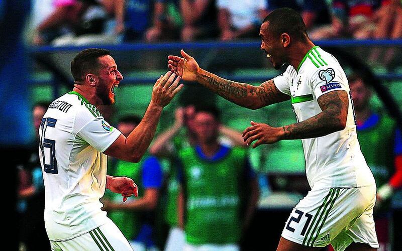 Northern Ireland's Conor Washington and Josh Magennis celebrate after their first goal of the game against Estonia during the UEFA Euro 2020 Qualifying, Group C match at A. Le Coq Arena, Tallinn. &nbsp;
