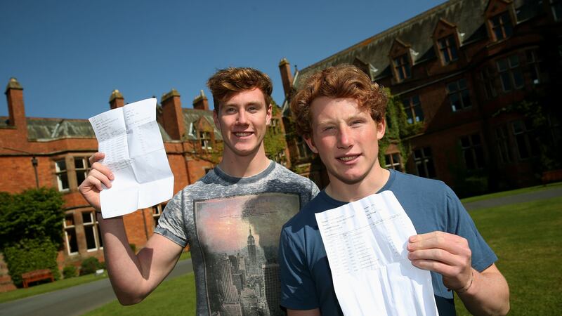 Twins Rory (left) and Patrick Butler celebrate their A-level results at Campbell College in Belfast
