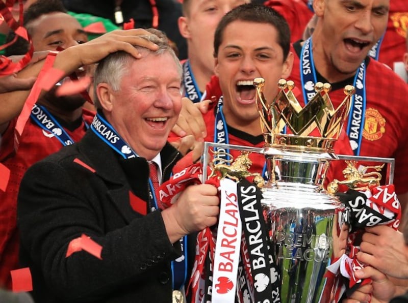 Manchester United manager Sir Alex Ferguson with the Barclays Premier League trophy