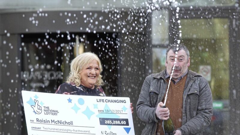Roisin McNicholl, from Dungiven, celebrates scooping &pound;285,288.60 in a Euromillions draw. Roisin is pictured with her husband, Martin. 