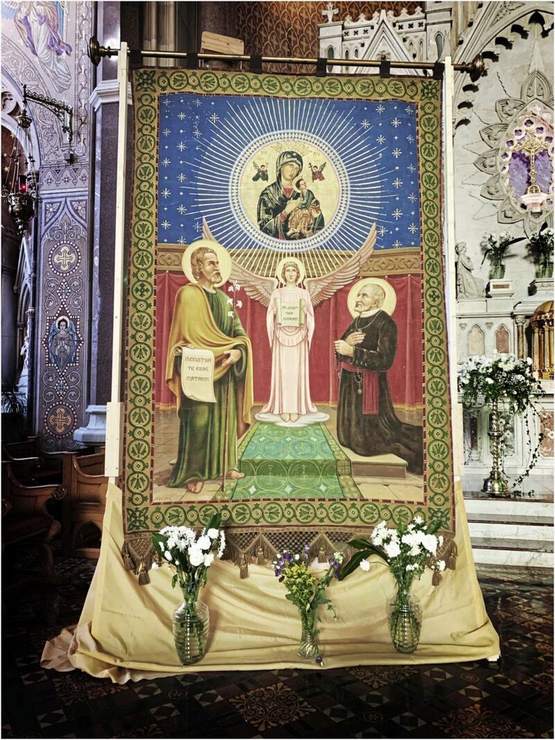 A women&#39;s confraternity banner which is on display on the altar in Clonard church. Picture: Hugh Russell 