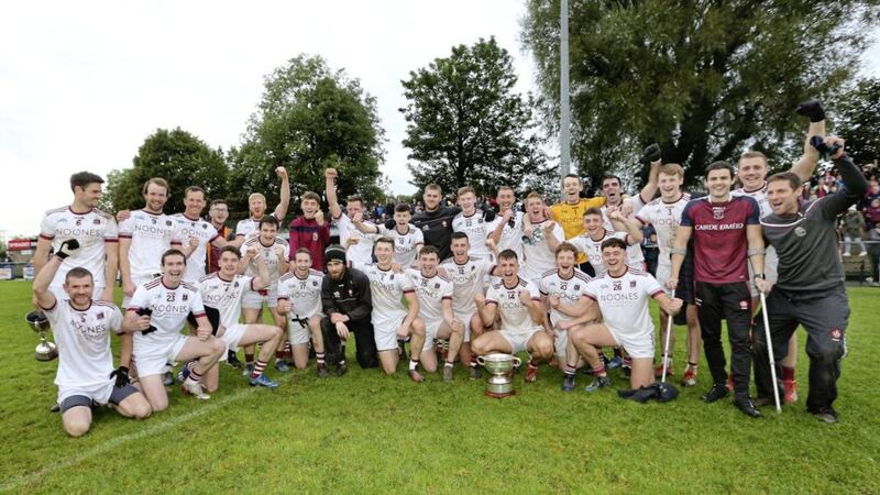 Slaughtneil celebrate after beating Magherafelt during the Derry Senior Football Championship Final at Bellaghy on Sunday. Picture by Margaret McLaughlin 