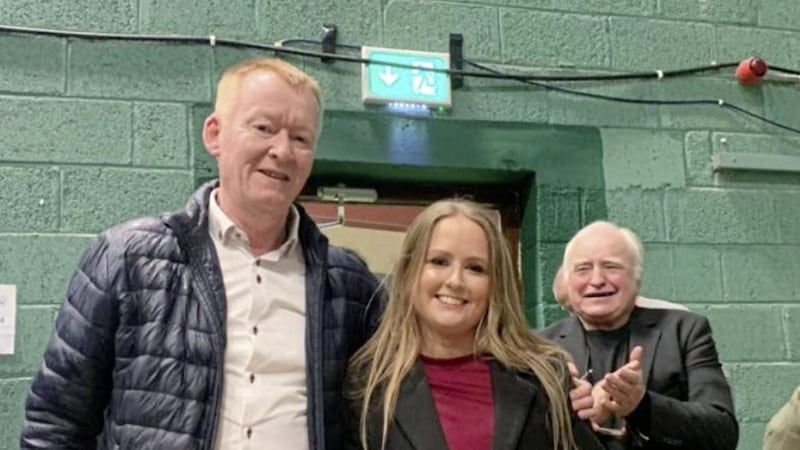 Newly-elected Sinn F&eacute;in TD Mair&eacute;ad Farrell (centre) with her election agent Cathal O&#39;Conh&uacute;ir 