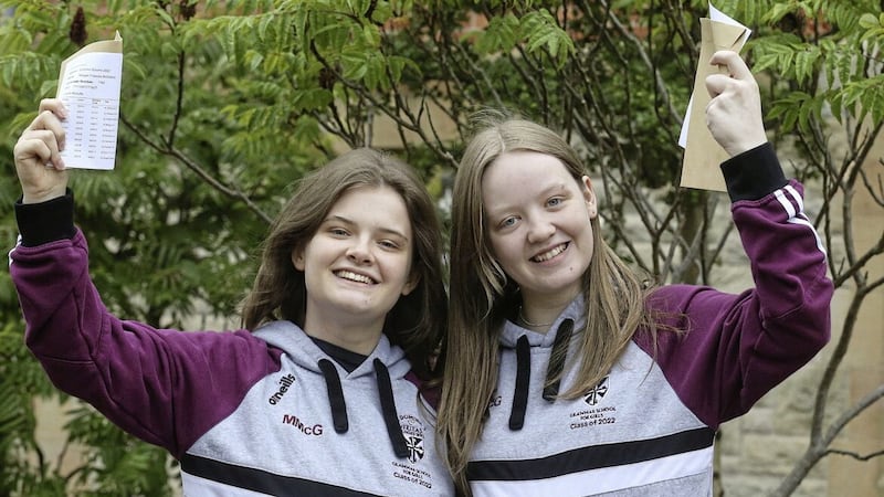 Happy twins Megan and Molly McGoldrick. Picture by Hugh Russell 