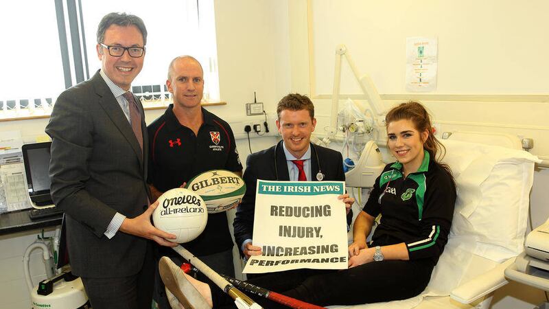 John Brolly (Irish News marketing manager), elite coach Mike McGurn, Dr Neil Heron (National Sports Clinic) and model patient Rebecca Mackle from Fr Rock&#39;s GFC, Cookstown, county Tyrone get ready for the Reducing Injury, Increasing Performance seminar, which is supported by the National Sports Clinic at Kingsbridge Private Hospital, Belfast, and delivered by 3fivetwo Training Academy in partnership with The Irish News 