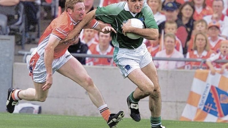 Stephen Maguire comes under pressure from Armagh&#39;s Francie Bellew during their 2004 All-Ireland quarter-final clash at Croke Park. Picture by Seamus Loughran 