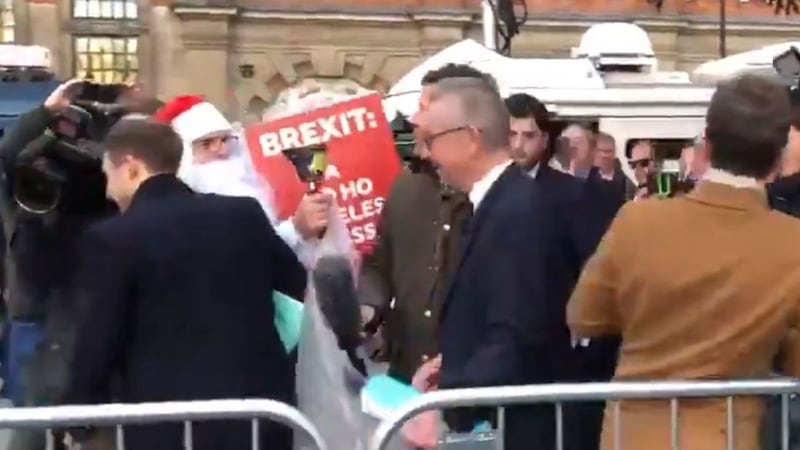 ‘You’ve been a very naughty boy,’ the anti-Brexit Santa told him.
