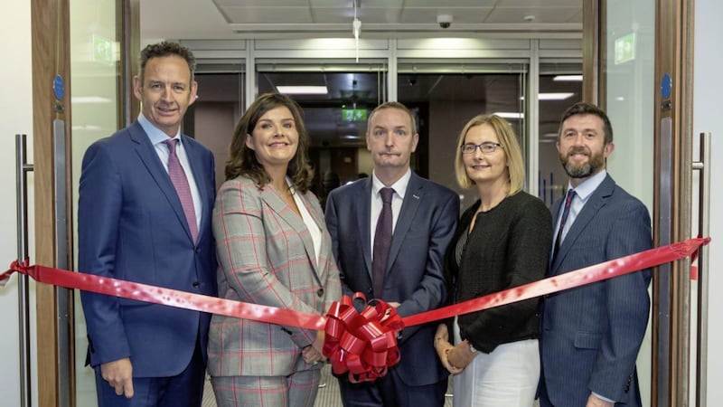 Julie Conlon (second from right), helping cut the ribbon on First Derivatives&#39; new Dublin offices last year. Also pictured are (L-R): Pat Brazel, Kathy Kearns, Ciaran Conlon and John Murphy. 