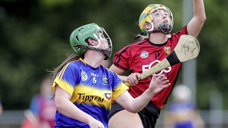 Liberty Insurance All-Ireland Intermediate Camogie Championship semi-final, Coralstown/Kinnegad GAA, Co. Westmeath on August 18 2018: Down&#39;s Aimee McAleenan and Hazel McAuliffe of Tipperary contest a high ball&gt; Picture: INPHO/Laszlo Geczo. 